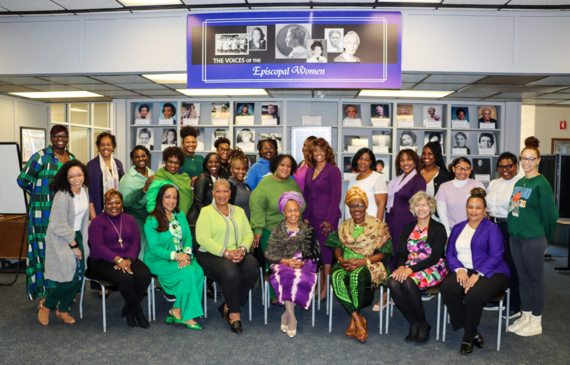 Female students, faculty and staff pose for International Women's Day