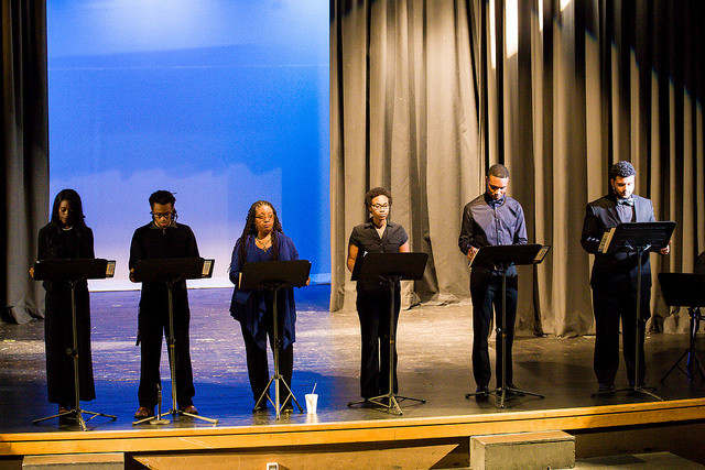 Members of SAU's Reader's Theatre performing.