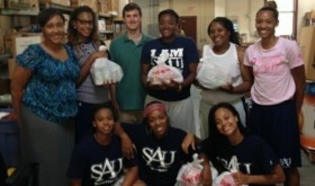 SAU Women&#039;s Basketball Volunteers with BackPack Buddies
